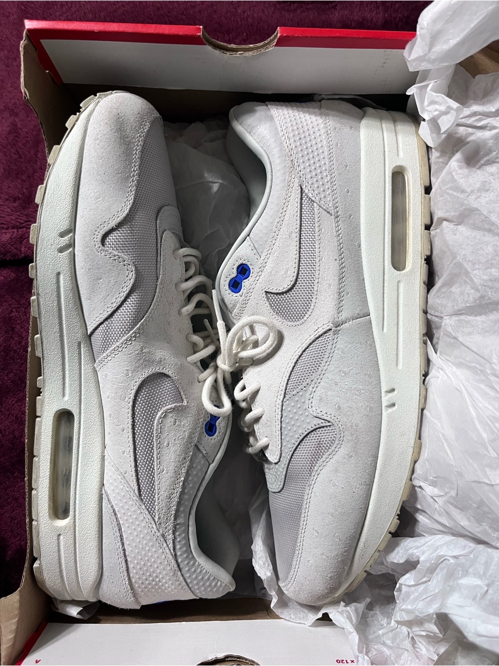 Nike Airmax 1 Premium Men’s Low-Top Athletic Sneakers in White with Blue Eyelets